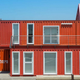 Illustration for article titled Shipping Container Offices Are Right at Home On an Industrial Seafront